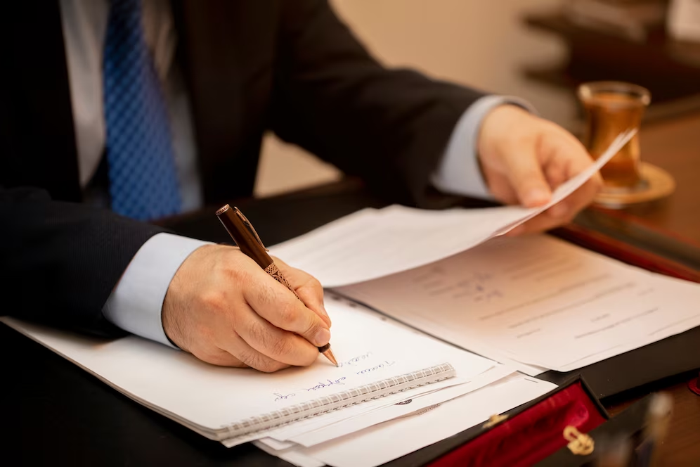 Man writing on paper