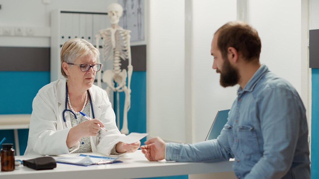 female doctor handing diagnosis to male patient