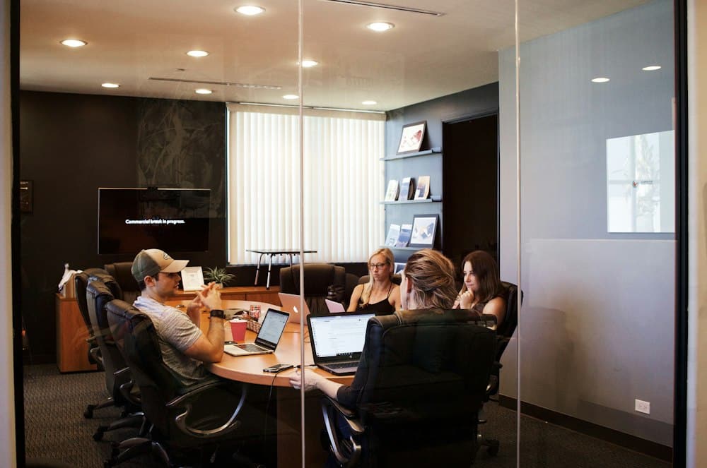 lawyers and clients conducting in a conference room